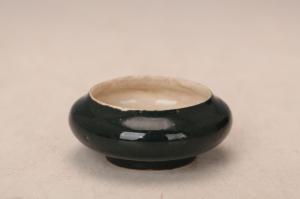 001504黑釉扁腹水丞
